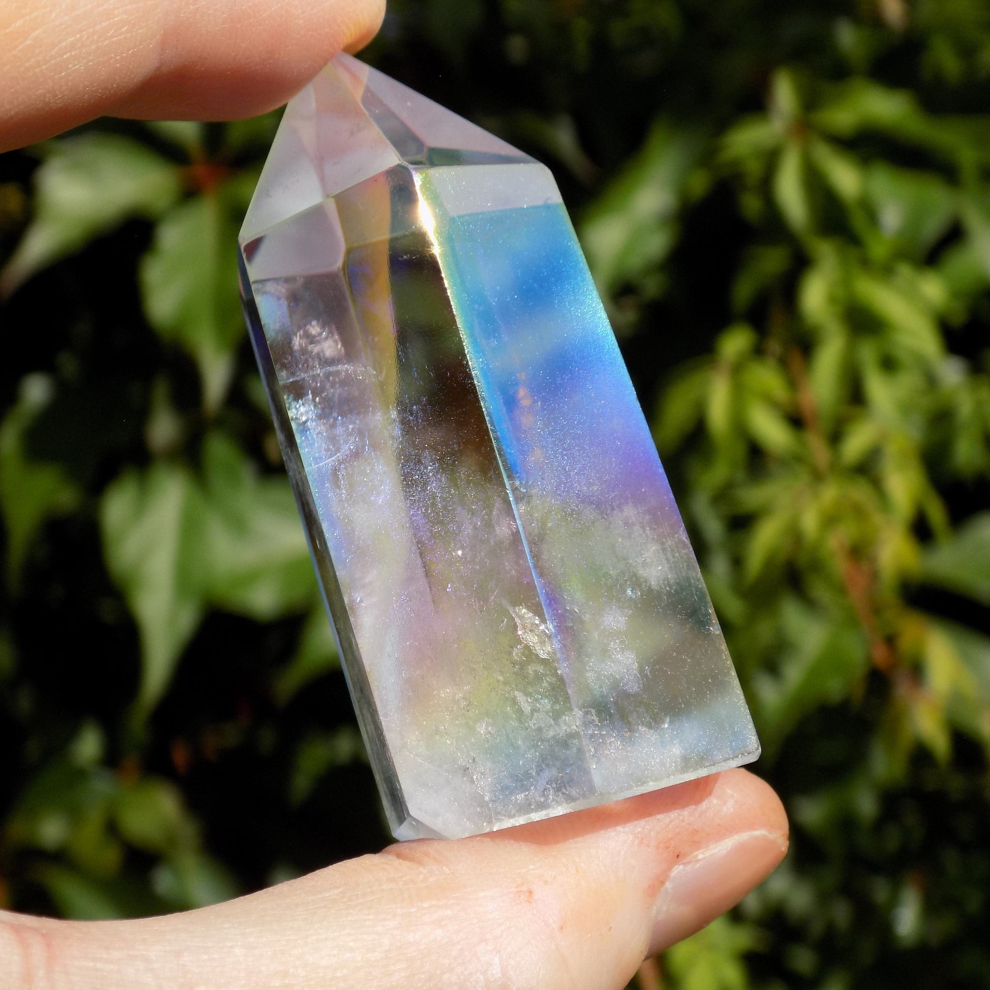 Rainbow iridescence of angel aura quartz crystal