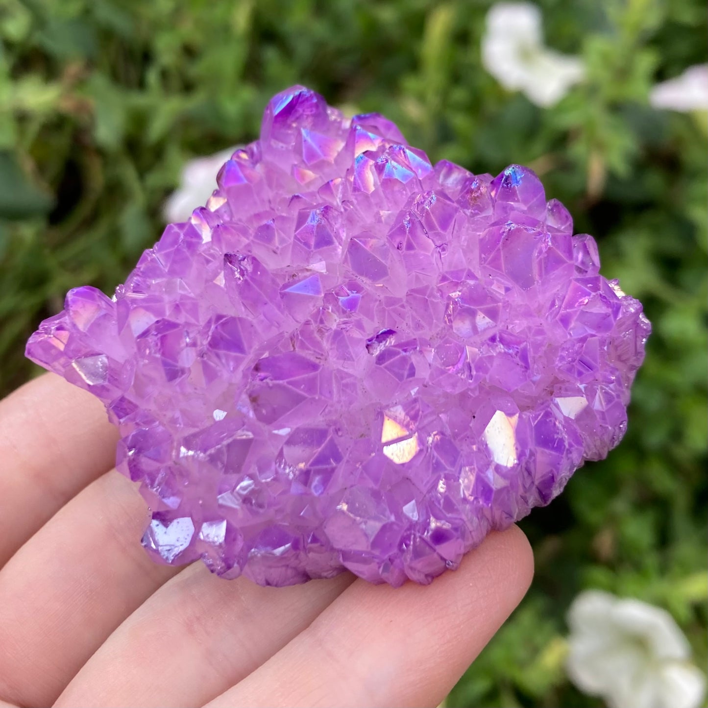 Lavender aura quartz crystal with flat base