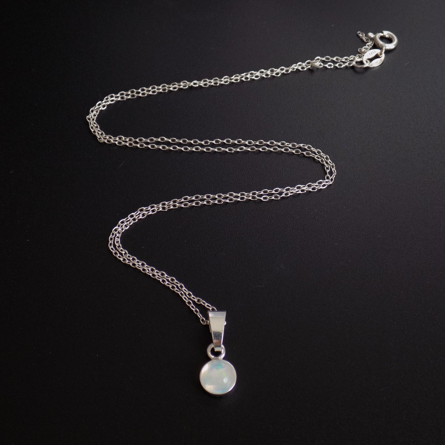 Minimalist opal pendant on sterling silver trace chain