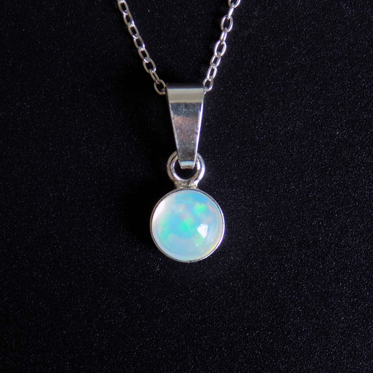 Dainty Ethiopian opal pendant 6mm, in sterling silver