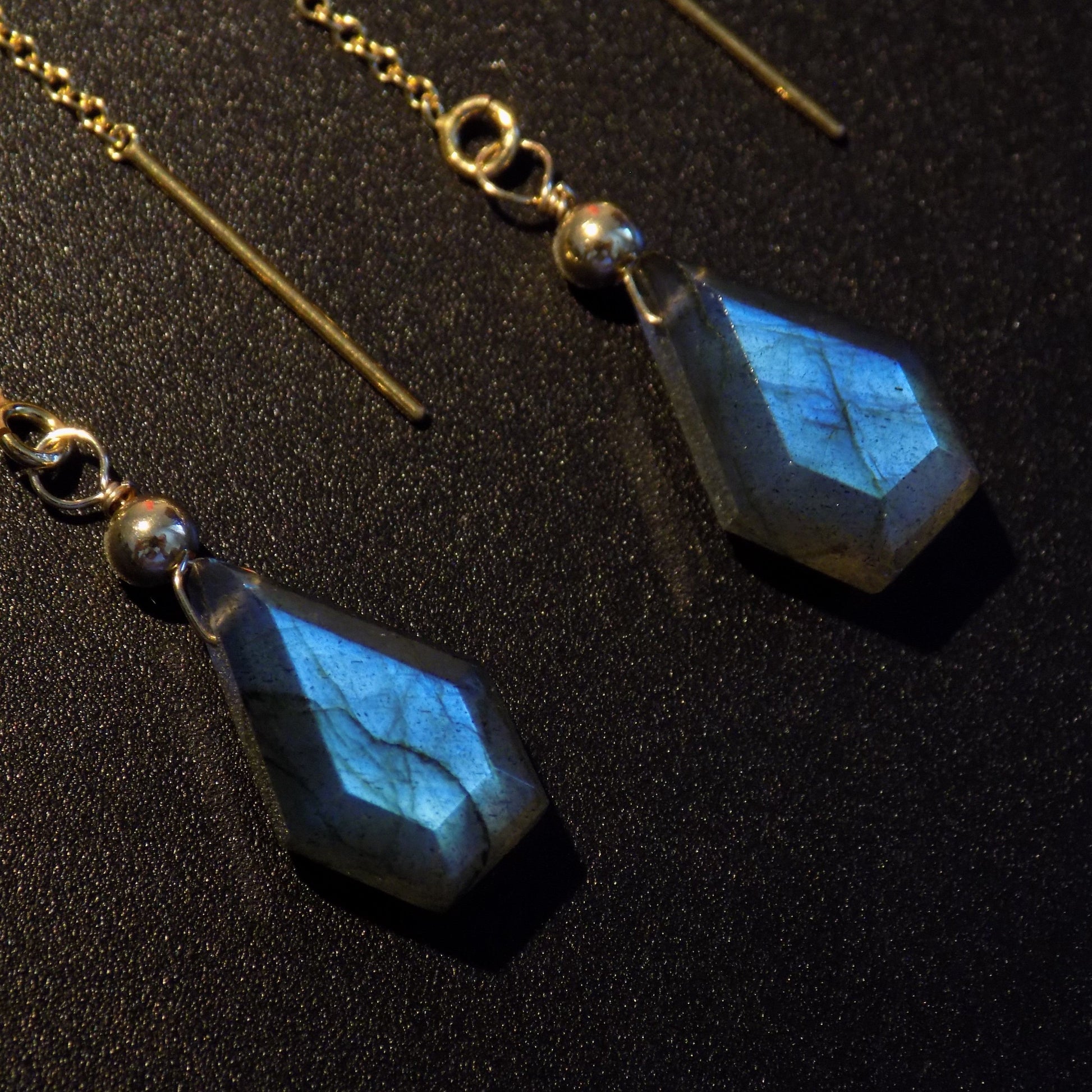 Close up of kite shape labradorite chain earrings