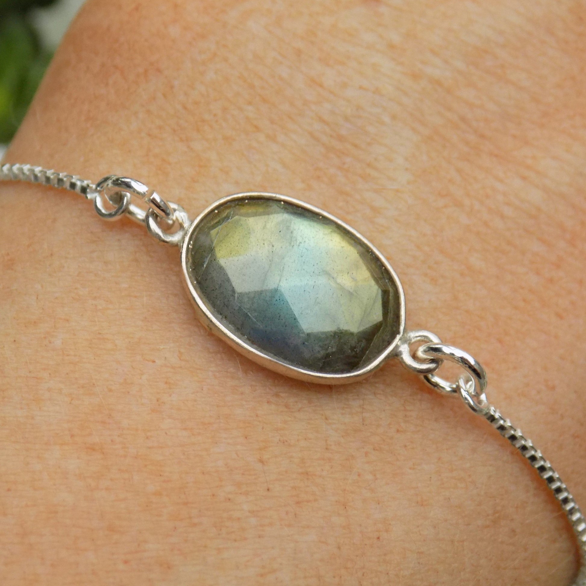 Adjustable labradorite bracelet showing yellow, green and blue colours