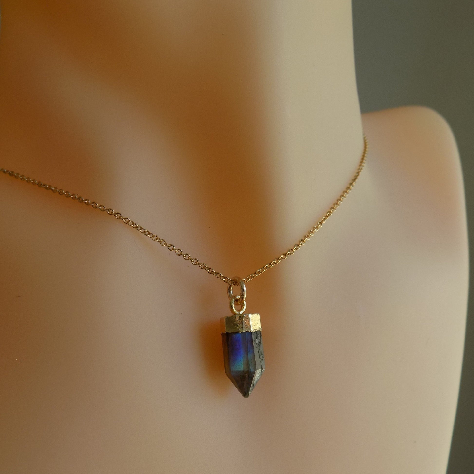 Labradorite point necklace on model