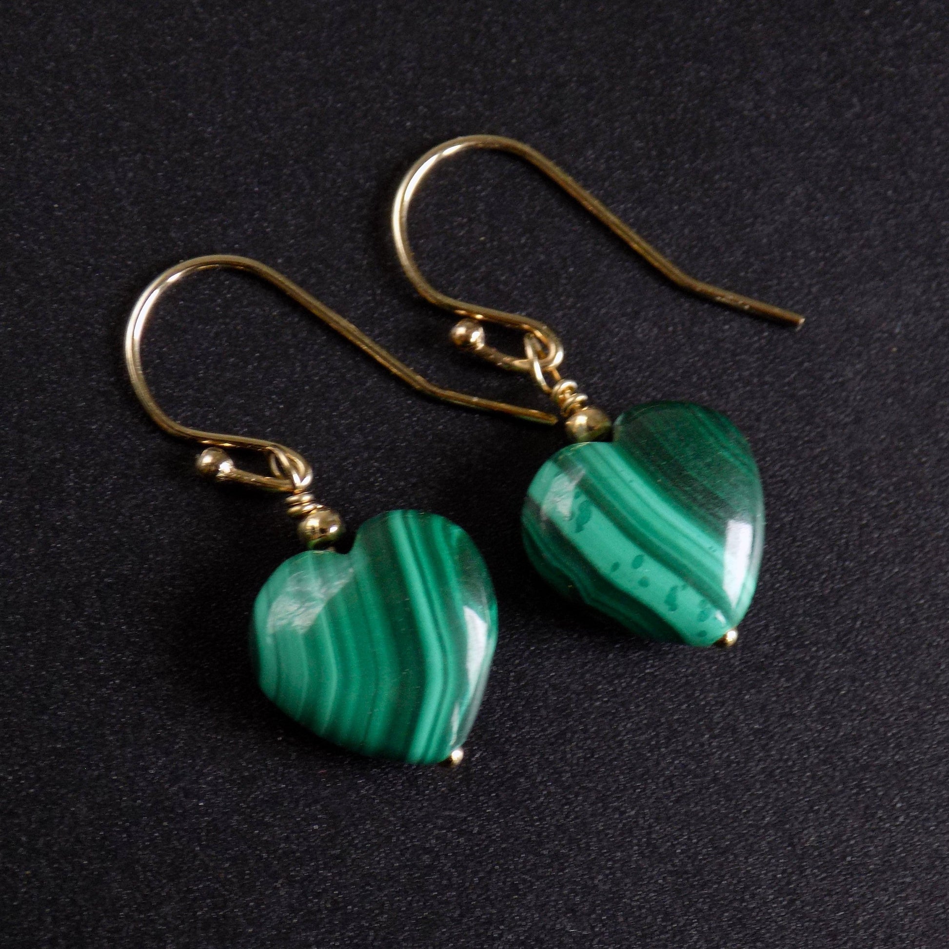 Real malachite heart earrings with natural banded patterning