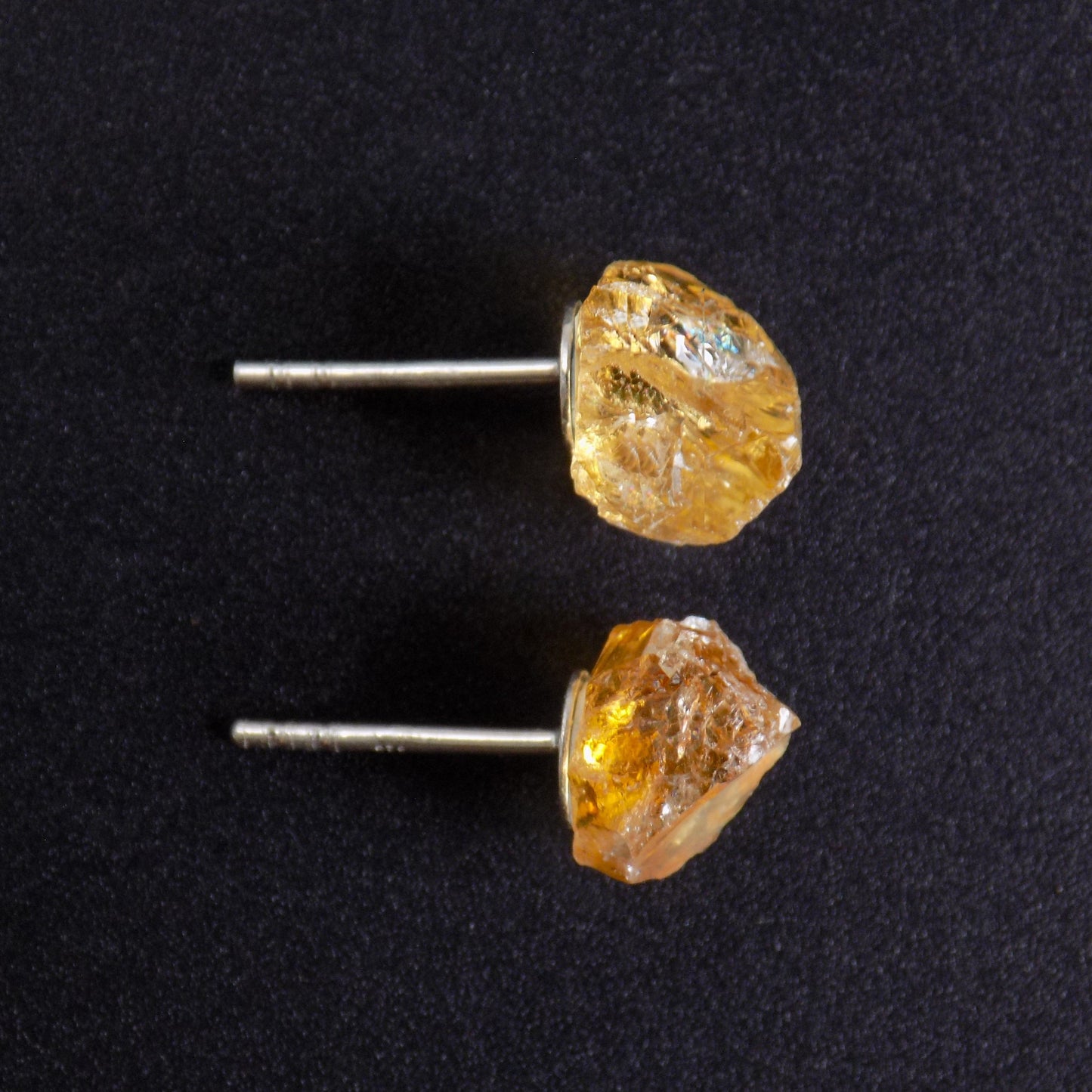 Top view of rough citrine ear studs