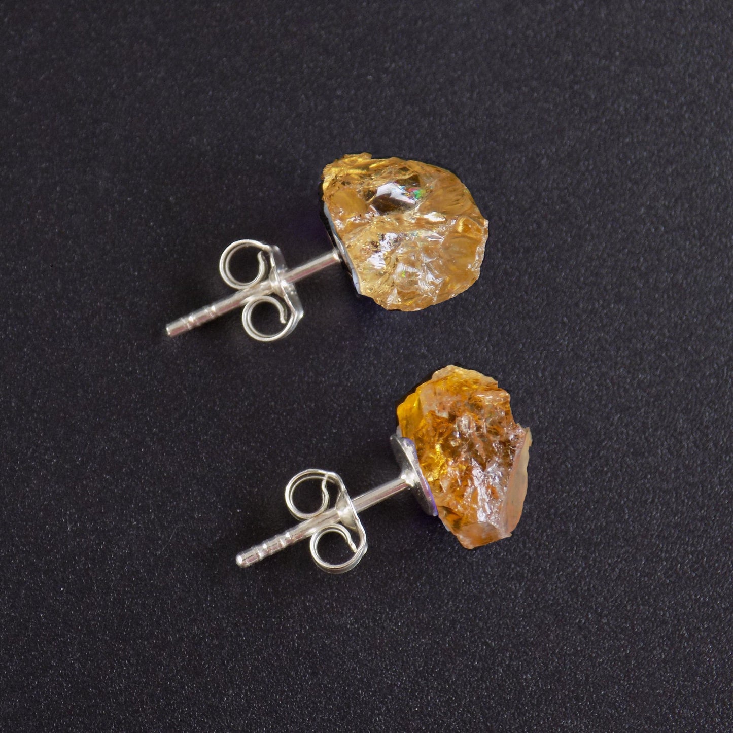 Citrine stud earrings in sterling silver with scroll backs