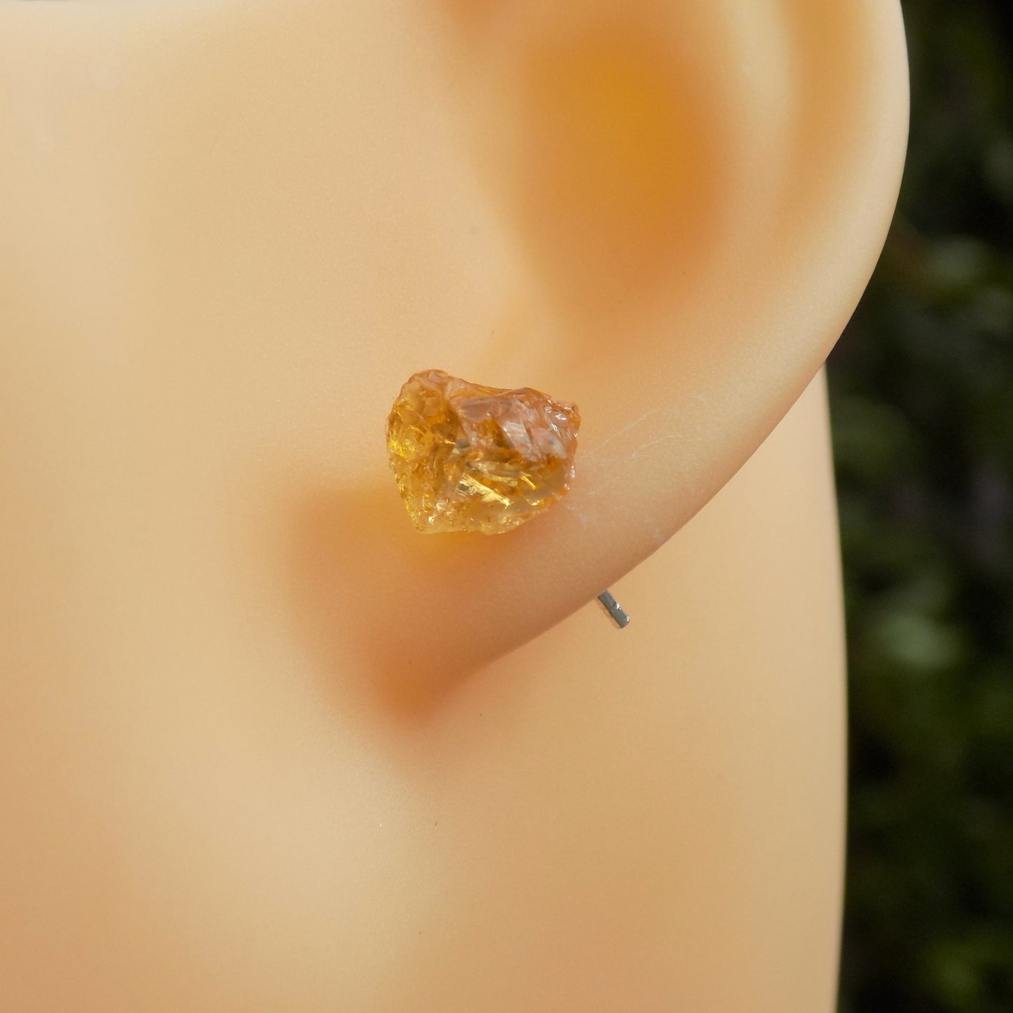 Raw citrine earring on model